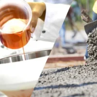 Construction workers adding chemical additives to cement