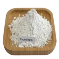 White calcined kaolin powder shown on a wooden plate